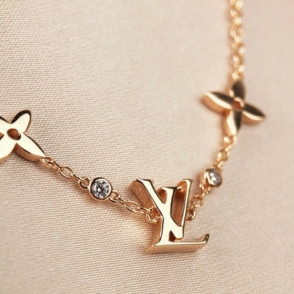 [Spark]STAR AND SUN 7 MOTIFS GOLD BRACELET