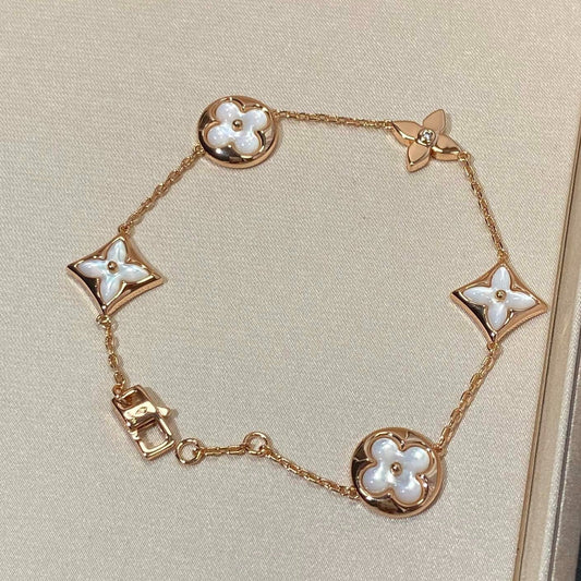 [Spark]STAR AND SUN 5 MOTIF MOP PINK GOLD BRACELET