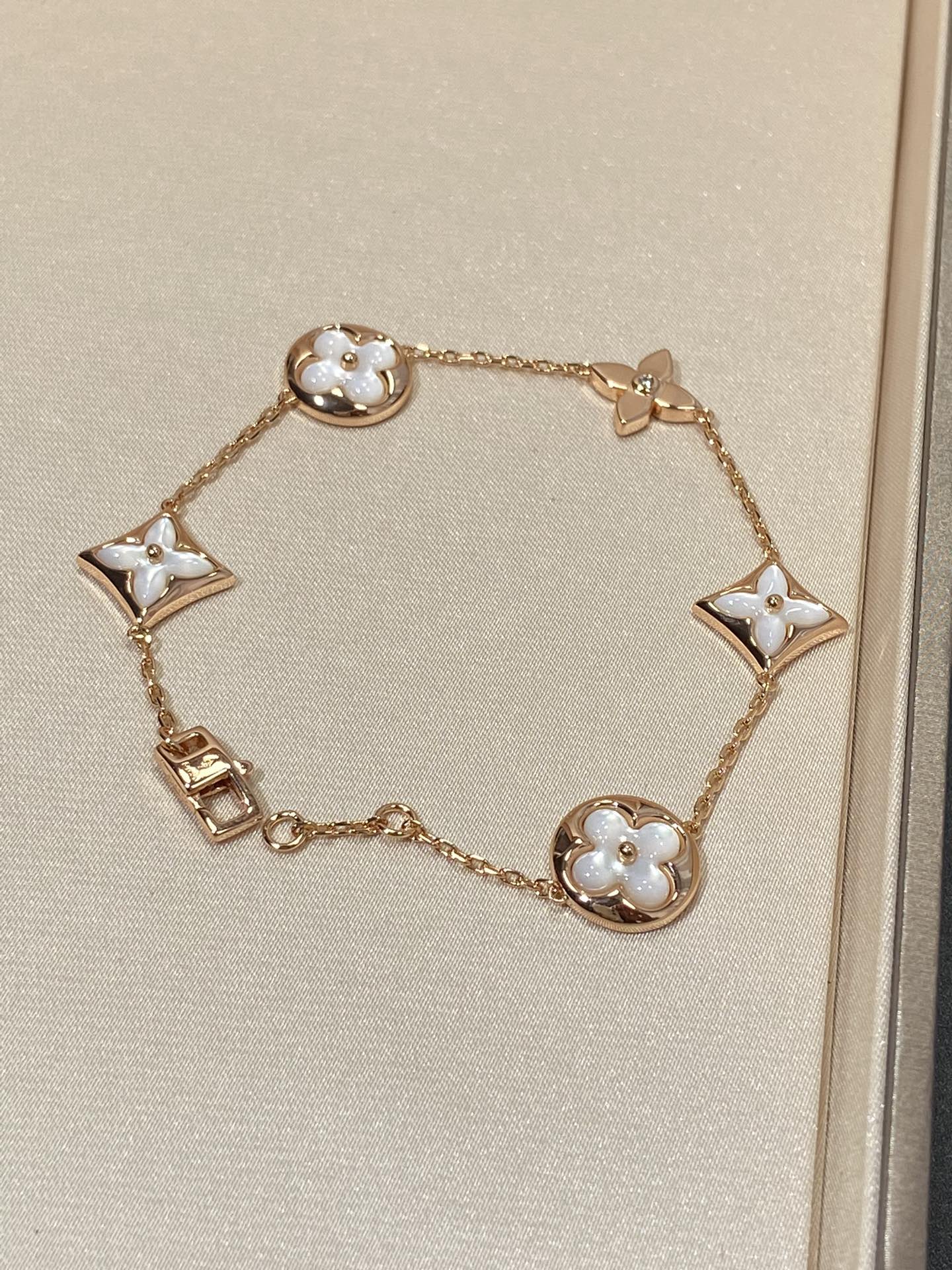 [Spark]STAR AND SUN 5 MOTIF MOP PINK GOLD BRACELET