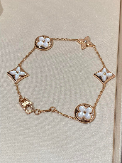 [Spark]STAR AND SUN 5 MOTIF MOP PINK GOLD BRACELET