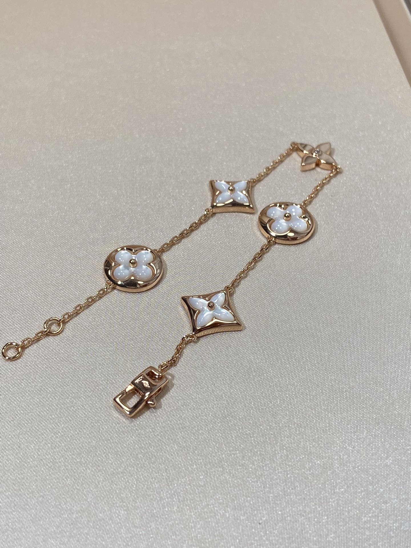 [Spark]STAR AND SUN 5 MOTIF MOP PINK GOLD BRACELET