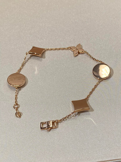 [Spark]STAR AND SUN 5 MOTIF MOP PINK GOLD BRACELET