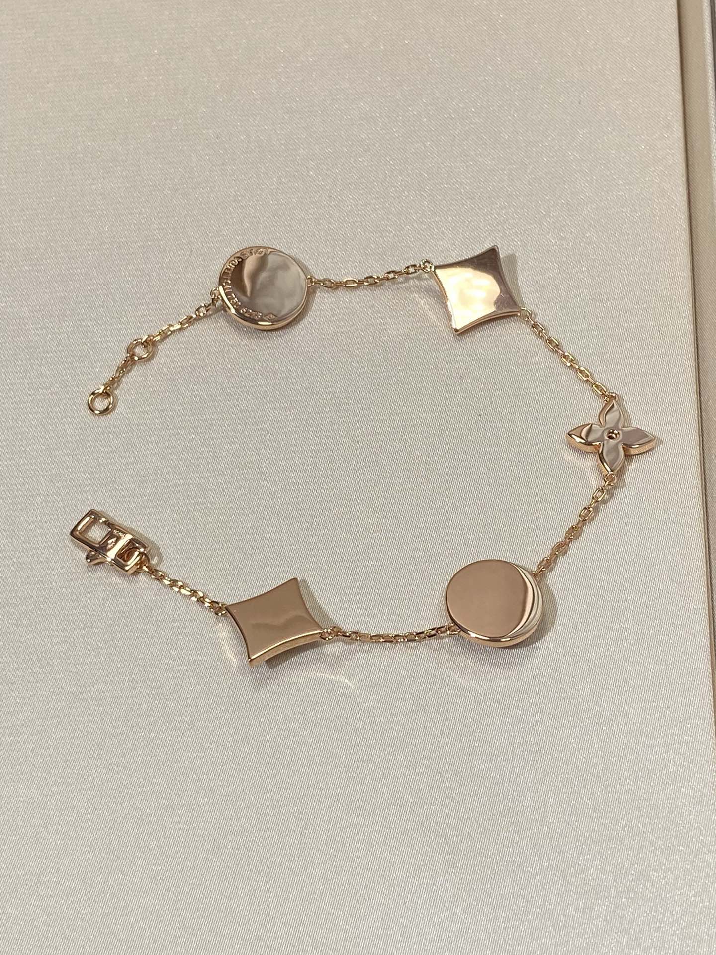 [Spark]STAR AND SUN 5 MOTIF MOP PINK GOLD BRACELET