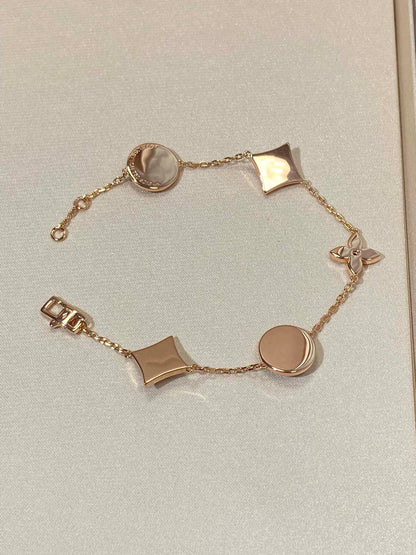 [Spark]STAR AND SUN 5 MOTIF MOP PINK GOLD BRACELET