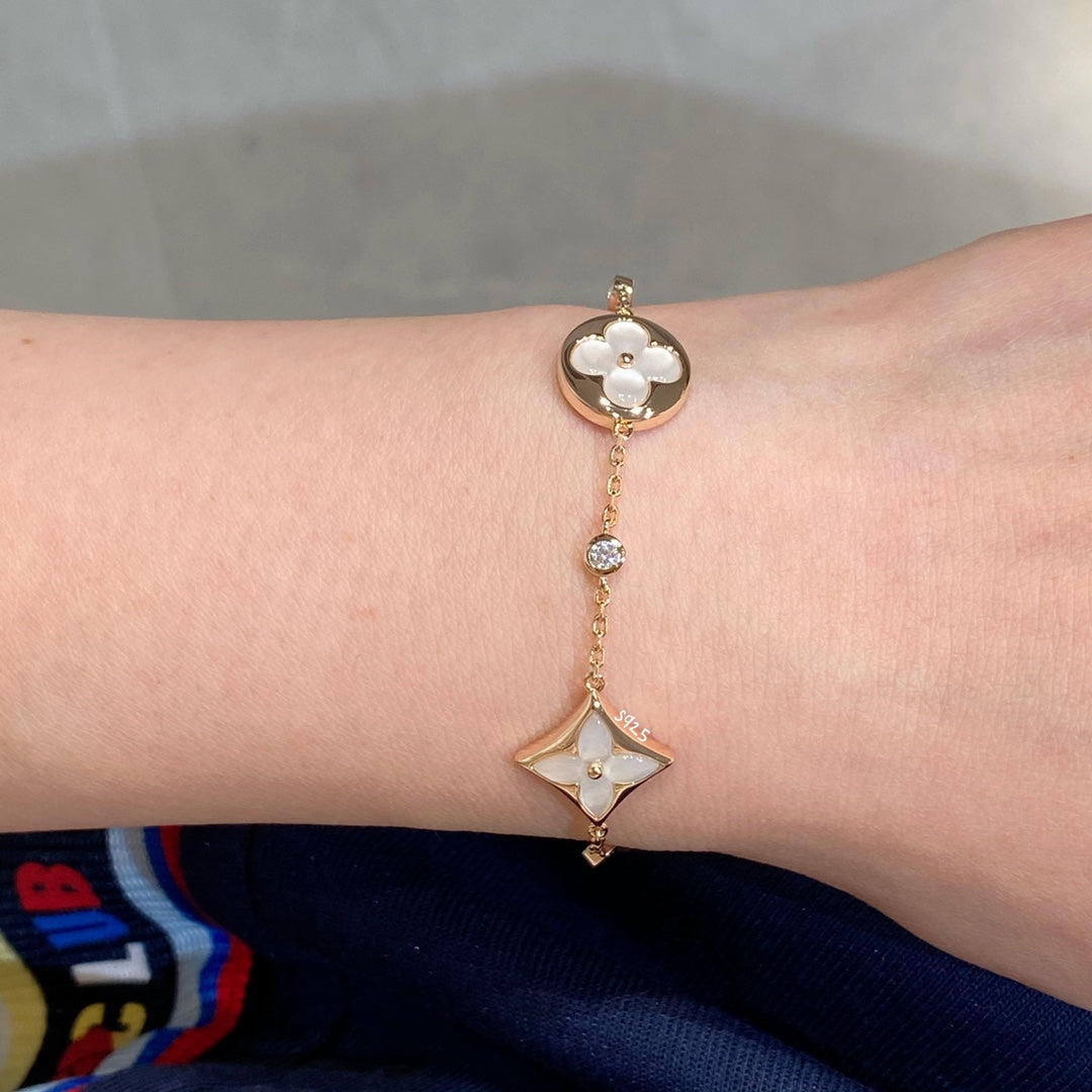 [Spark]STAR AND SUN 4 MOTIF WHITE MOP PINK GOLD BRACELET