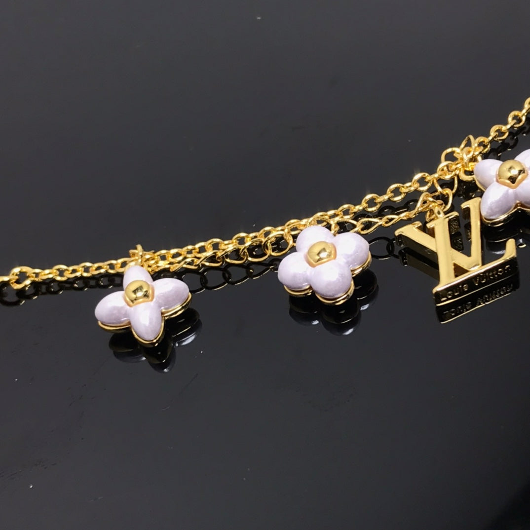[Spark]LOGO 6 MOTIF STAR AND SUN GOLD BRACELET